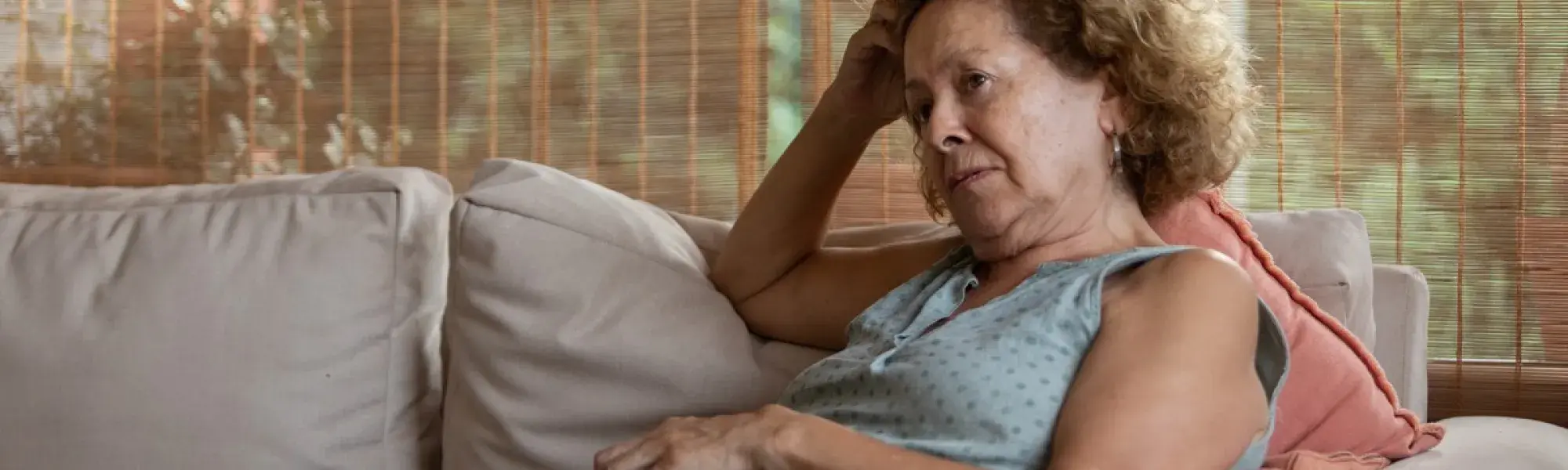 woman on couch with cat