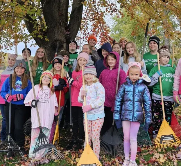 day of caring volunteers 2025