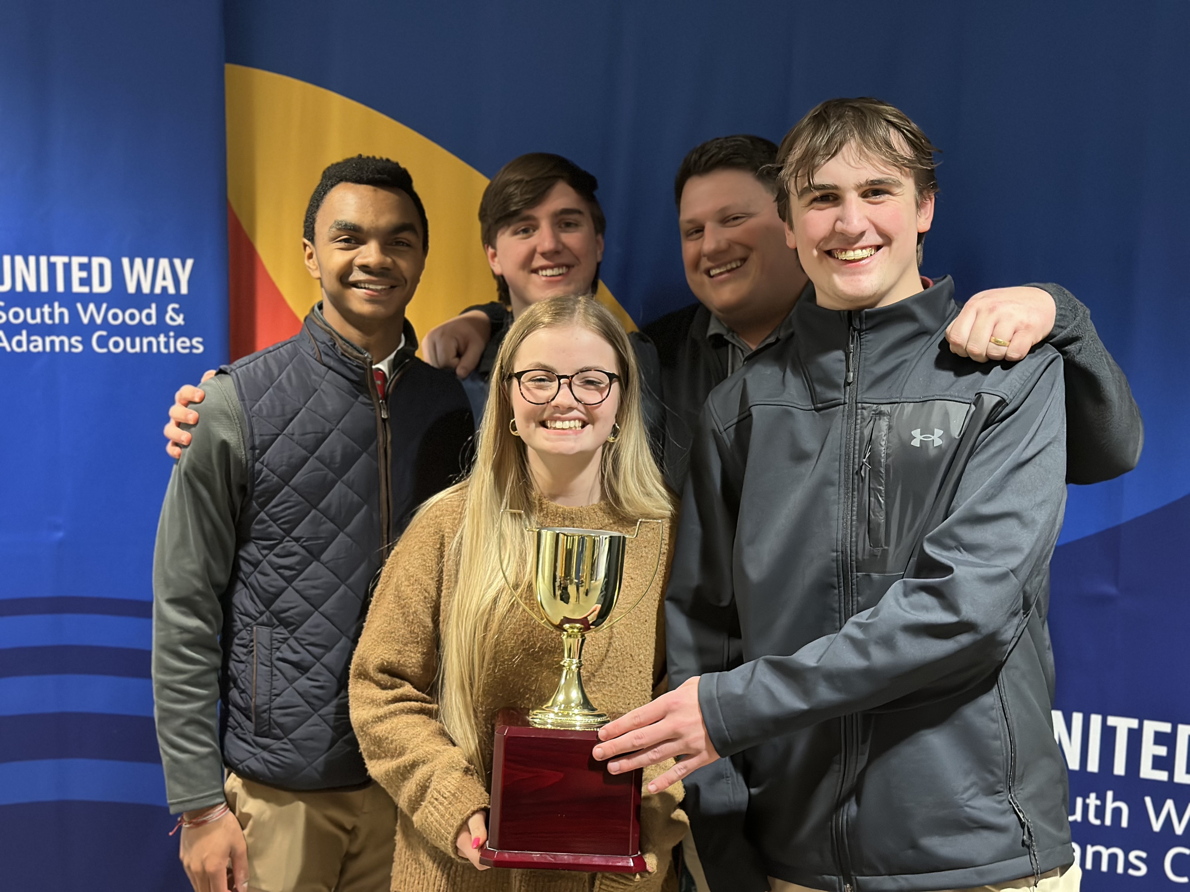 Winners of the Finance and Investment Challenge Bowl 2025 from Lincoln High School with their teacher